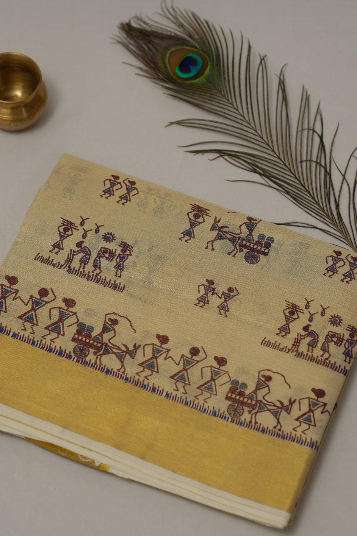 GOLD TISSUE TRIBAL MOTIF PRINT KERALA SET SAREE