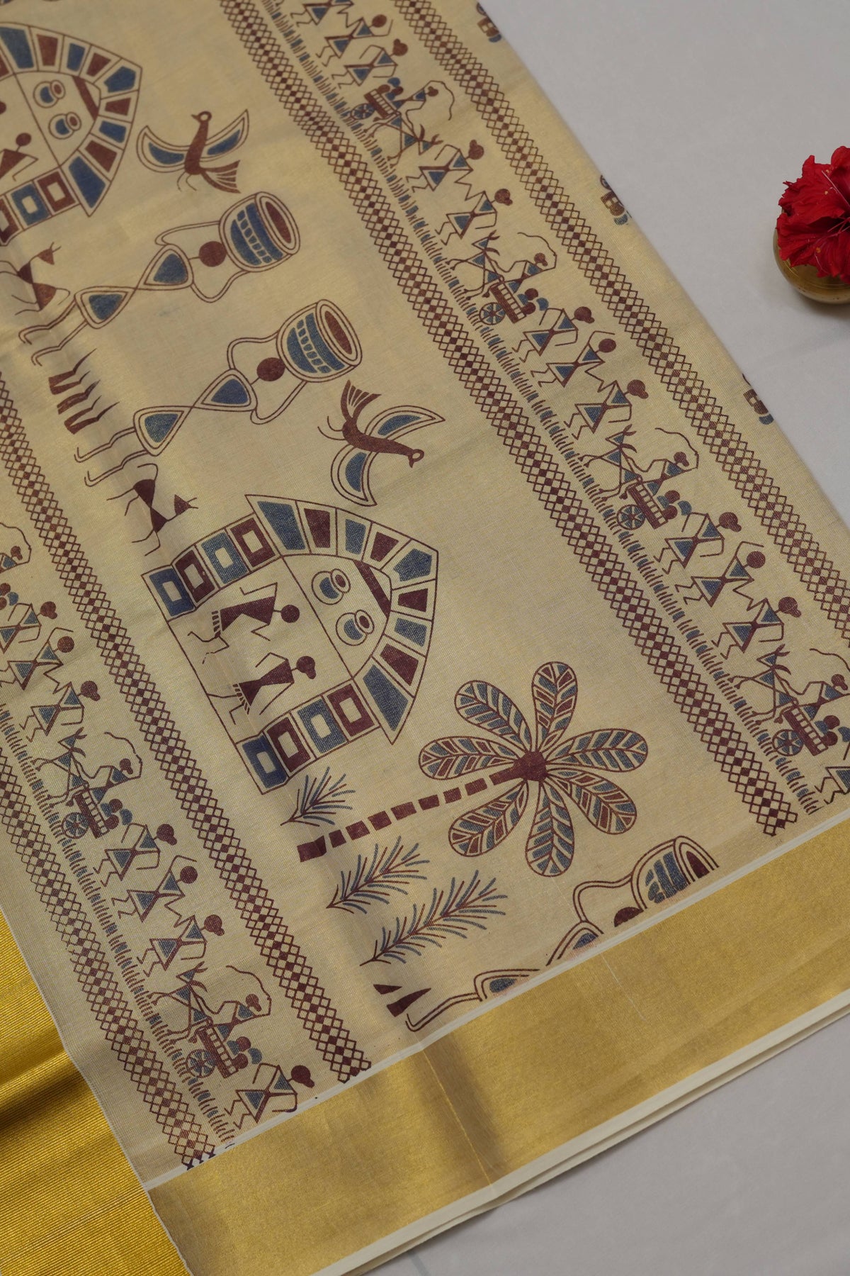 GOLD TISSUE TRIBAL MOTIF PRINT KERALA SET SAREE